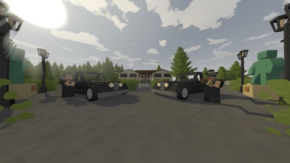 Two mobsters holding machine guns face you down ominously.